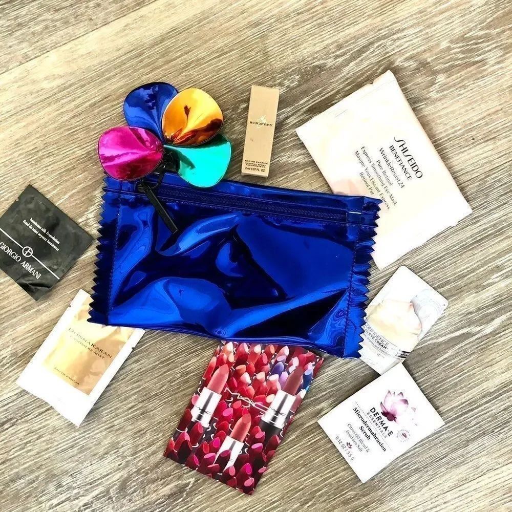 Mac metalic blue makeuo bag with flower chain